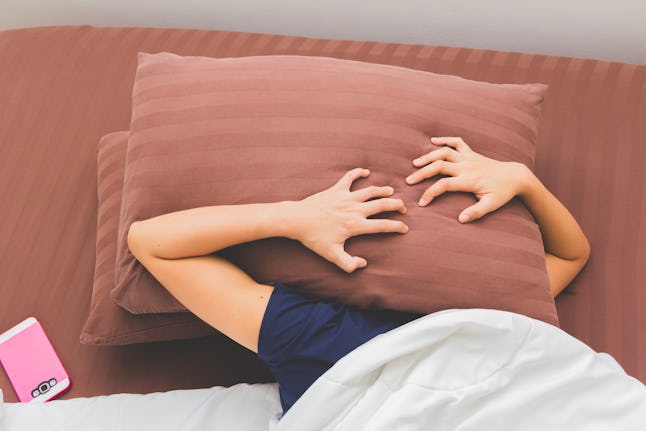 woman can't fall asleep because of the noisy
